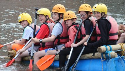 children on a raft
